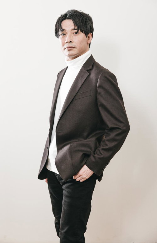 共に新しいサービスを創りましょうと提案する取締役の姿勢