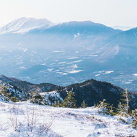 冬の四阿山から眺める雪化粧した浅間山と雪山の絶景の写真