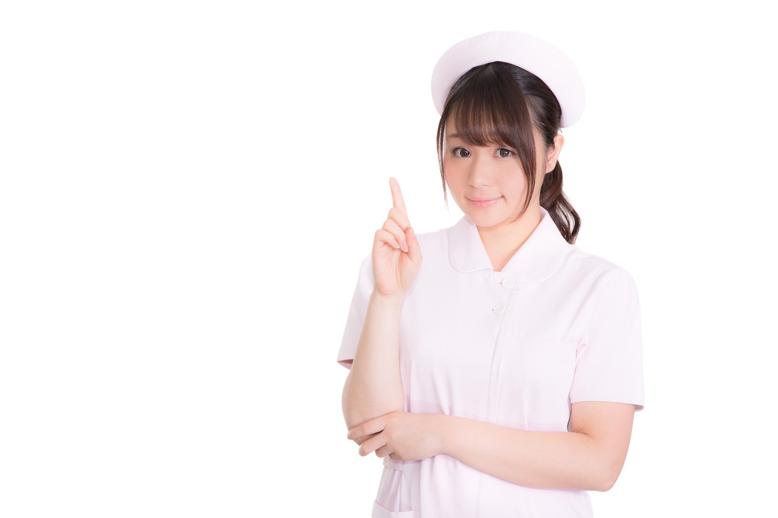 人差し指を立てるナース服の女性［モデル：茜さや］