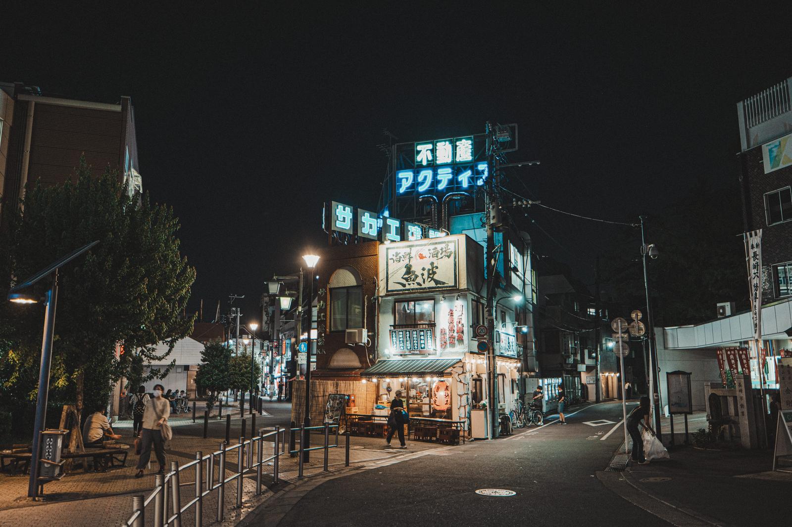 Nightview of Shiina-machi station, Showa retro shopping district with glowing neon signs