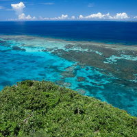 宮古島の三角点から撮影した海岸線と珊瑚礁の空撮の写真