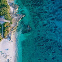 来間島のムスヌン浜を空撮した宮古ブルーの海岸の写真