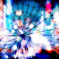 光りに包まれた観覧車のフォトモンタージュの写真