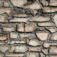 割れたレンガで造られた古い壁のテクスチャーの写真