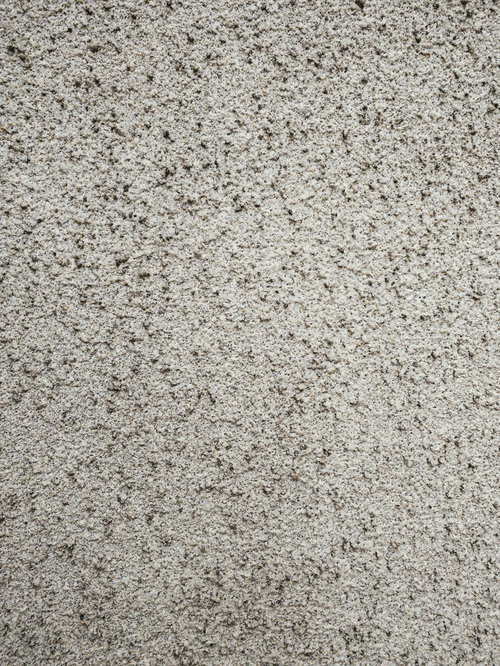 細かい粒を固めたグレーの壁テクスチャー