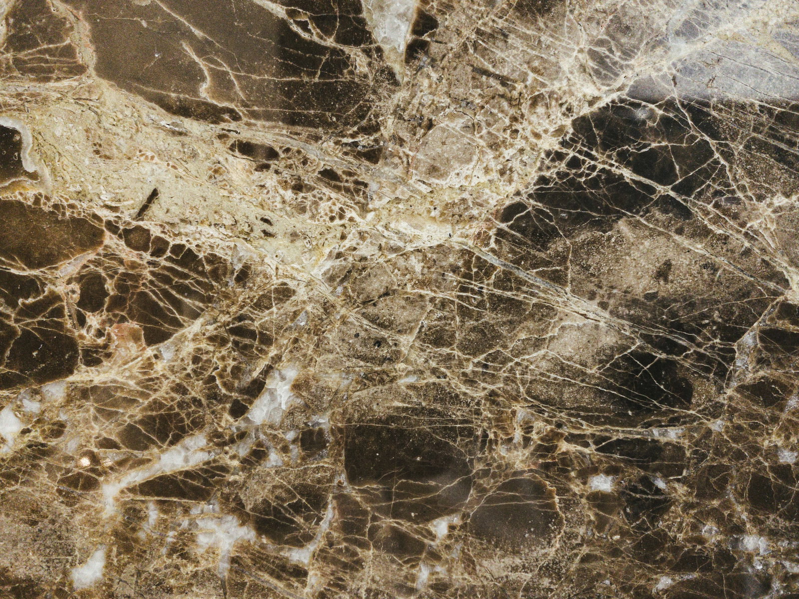 茶色とベージュのマーブル模様が美しい大理石の表面テクスチャー