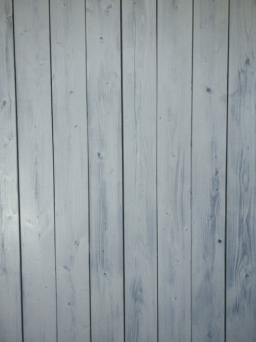 白くペイントされた木目が見える板のテクスチャー