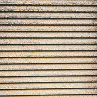 ムラなく錆付くシャッターのテクスチャーの写真