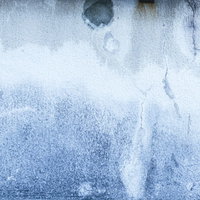 エフロで白く染まるコンクリート壁のテクスチャーの写真