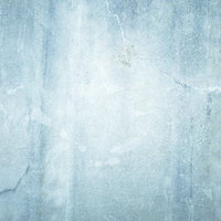 ひび割れを補修したコンクリート壁の表面テクスチャーの写真