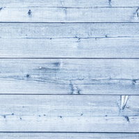 白色に塗装した板壁の木目と節が見える質感の写真