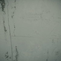 クラック入りのグレーコンクリート壁のテクスチャーの写真