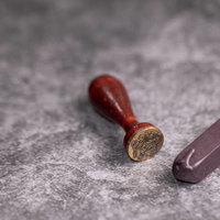 封蝋（シーリングワックス）スタンプとワックススティックの写真