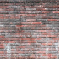 経年変化が見える汚れたレンガ壁のテクスチャーの写真
