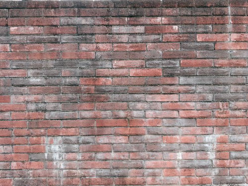 経年変化が見える汚れたレンガ壁のテクスチャー
