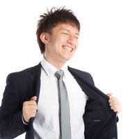 クールビズキター！スーツで暑くて苦しい男性の写真