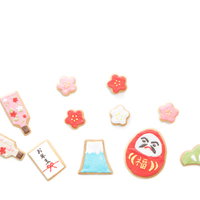 羽子板とだるまのお正月アイシングクッキーの写真