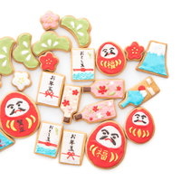 お年玉や羽子板、だるまなどお正月向けのアイシングクッキーの写真