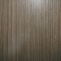 縦に流れる木目模様の板壁の写真