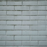 グレーに統一された煉瓦の壁のテクスチャーの写真