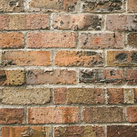 表面が剥がれた煉瓦の壁テクスチャーの写真