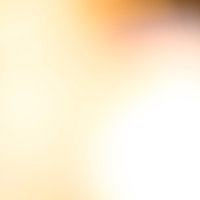 温かみのある黄色とオレンジのぼかしグラデーションの写真
