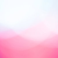 寒色と暖色が混ざり合う光のボケ背景の写真