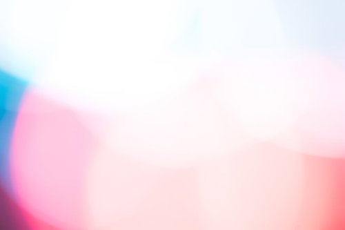 暖色とボケ味で仕上げた淡いグラデーション背景