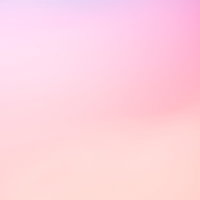 ピンク色のボケた光のグラデーション背景の写真