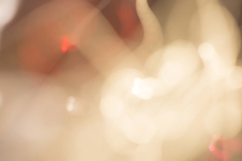 禍々しい光のボケ 暖色の不気味な背景