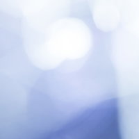 寒色の光ボケ背景 青紫のグラデーション光の写真