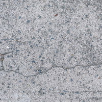 老朽化した舗装道路のひび割れたコンクリートの写真