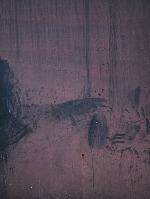 墨跡が残る古い木材のテクスチャー