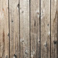 濃い節が残る木の板のテクスチャーの写真