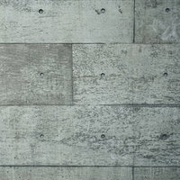 コンクリート打ちっぱなしの壁に残るピーコン跡と無機質なテクスチャーの写真