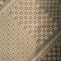 異なる幾何学模様が組み合わさったカーペットと絨毯の写真