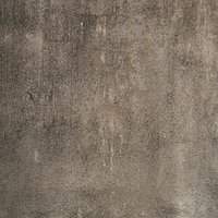 経年劣化でシミが一面に広がるコンクリート壁のテクスチャの写真