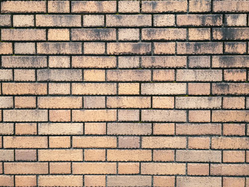 シミが残る煉瓦の壁面テクスチャ