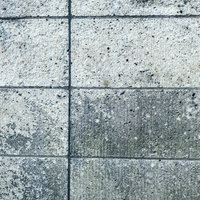 グレー系コンクリートブロック塀の目地がはっきり見えるテクスチャーの写真