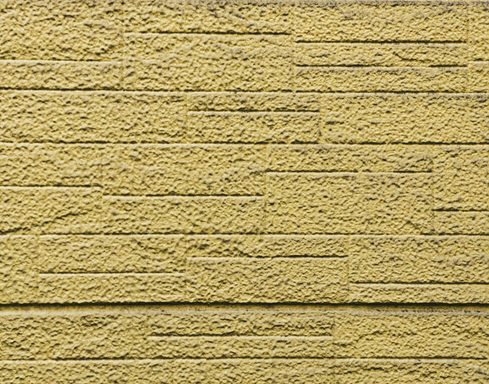 Mortar-finished block wall with horizontal grooves