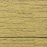 モルタル仕上げのブロック塀の規則的な溝（テクスチャ）の写真