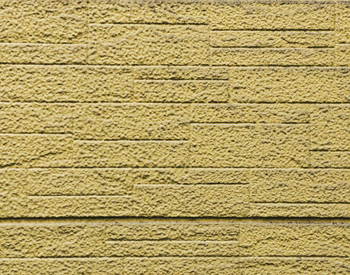 モルタル仕上げのブロック塀の規則的な溝（テクスチャ）