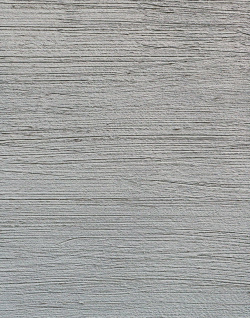 細かい水平線の入ったグレーのモルタル外壁テクスチャ