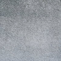 グラデーション色が変わるモルタル外壁のテクスチャーの写真