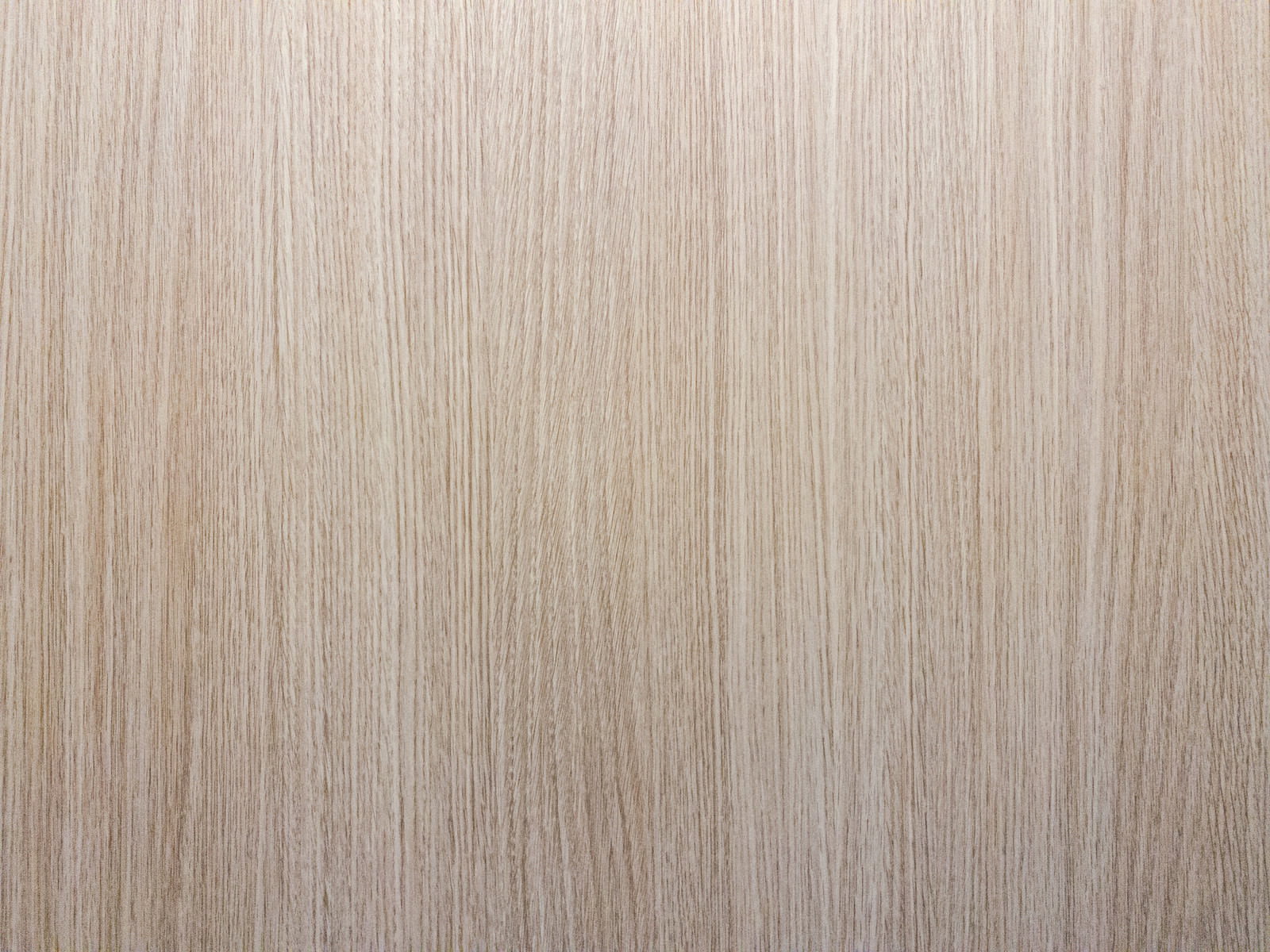 うっすらと木目の入った淡いベージュ色の板の表面