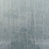 白く薄いグレーの線が入った壁のテクスチャーの写真