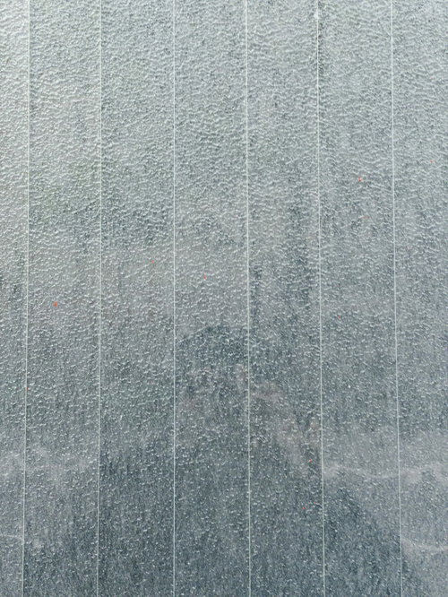 白く薄いグレーの線が入った壁のテクスチャー