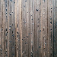 節の目立つ木の板壁のテクスチャーの写真