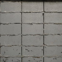 積まれたばかりのコンクリートブロック塀の表面テクスチャーの写真