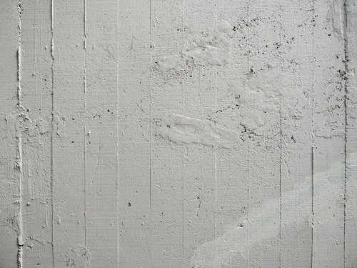 コンクリート壁の補修跡と枠板跡のテクスチャ